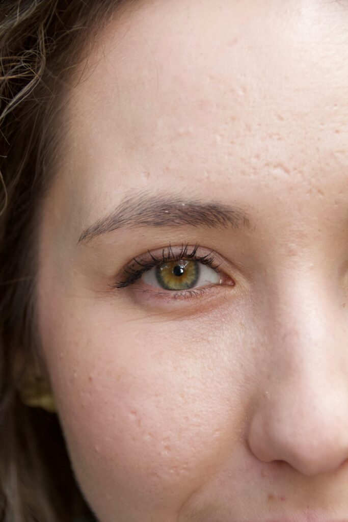 Detailed close-up of a woman's eye showcasing natural skin texture and beauty.